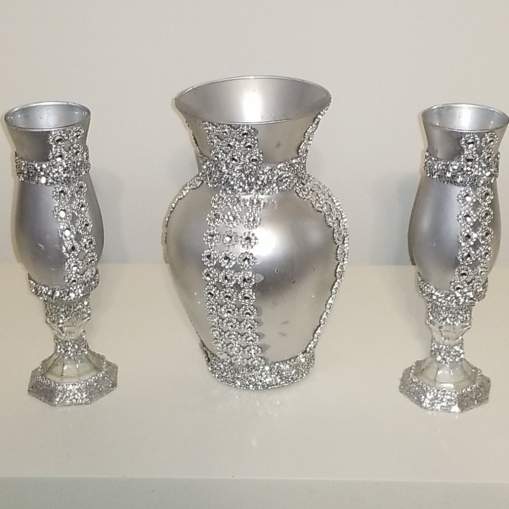 Silver vase and candleholders